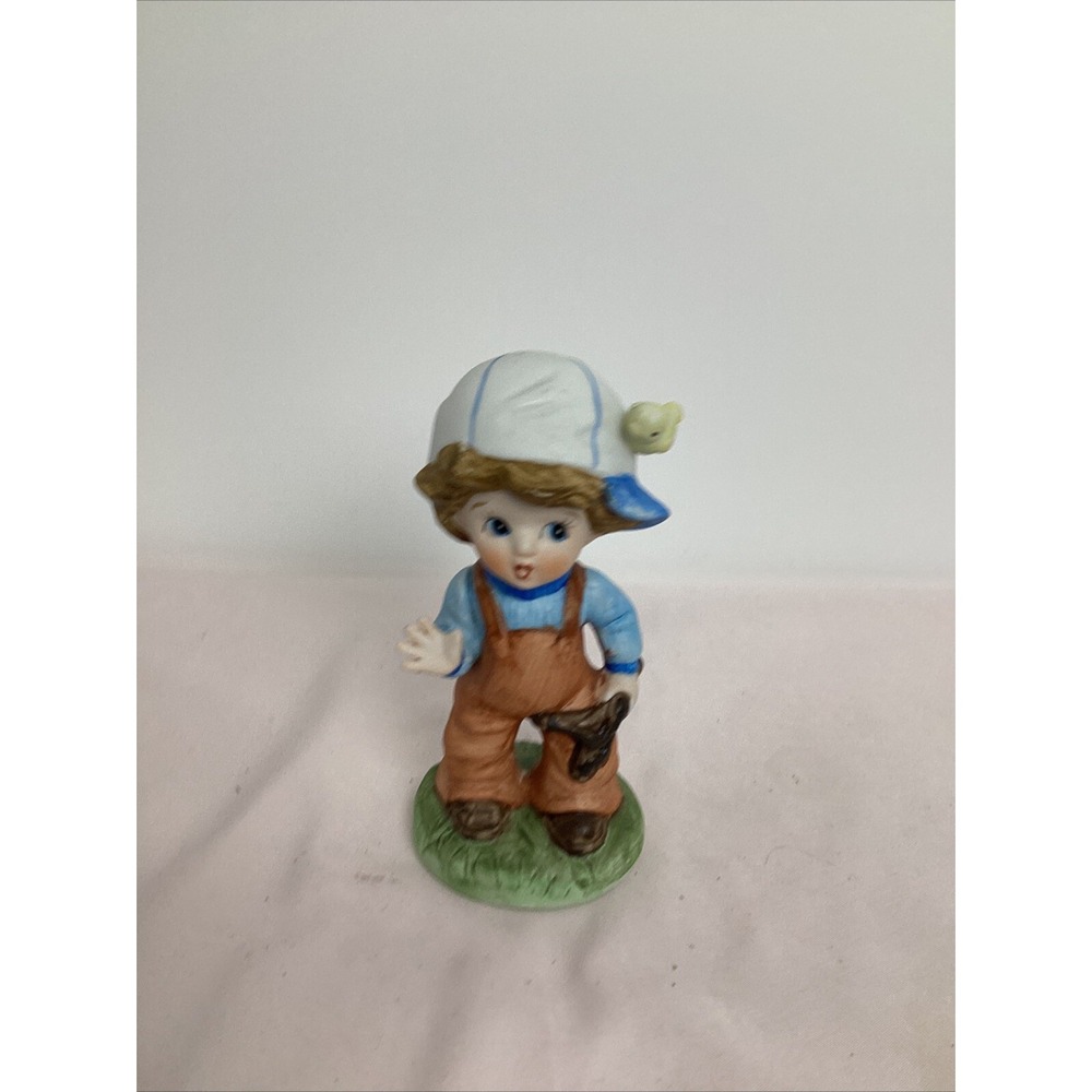 HomCo Vintage Little Baseball Cap Boy With Yellow Bird On Cap Slingshot In Hand